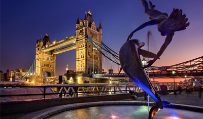 London Tower Bridge in blue and orange light.