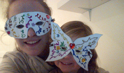 Claire and her host child wearing masks
