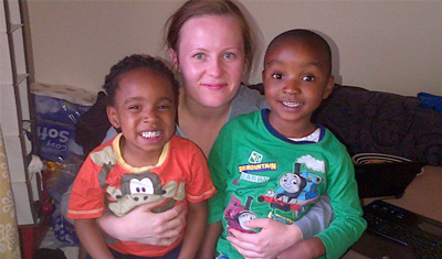 Vendy with her two host children