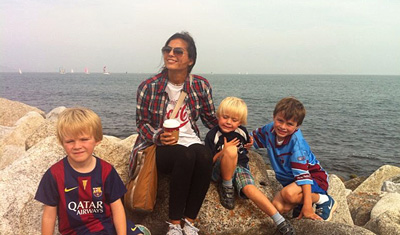 Greg's children with their au pair at the beach
