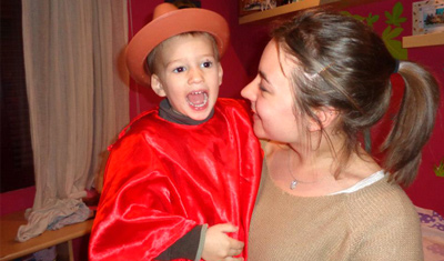 Helen with her host child in a costume