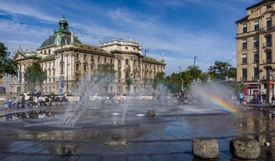 City centre of Munich with a fountain on a sunny day