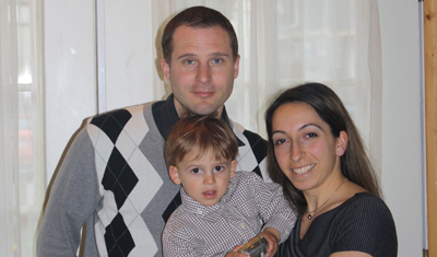 Caroline with her husband and their little boy