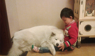 Gina's host child and dog