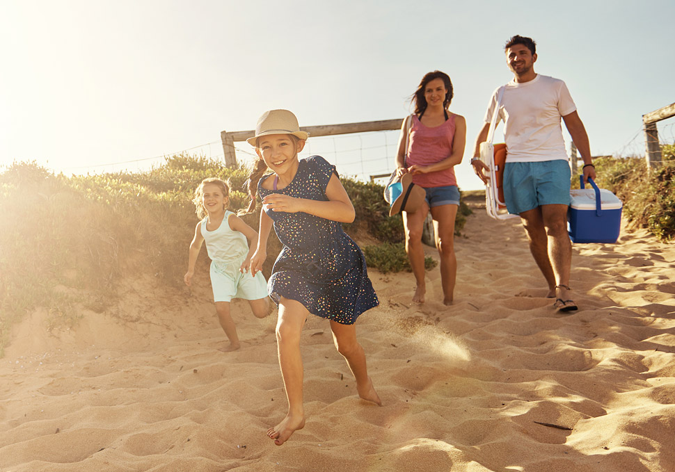 A family being excited about going to the beach