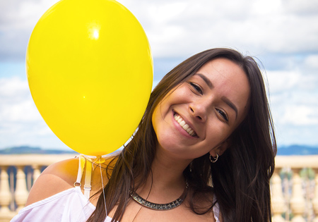 A young woman with a balloon