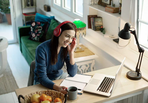 A Woman in front of a laptop