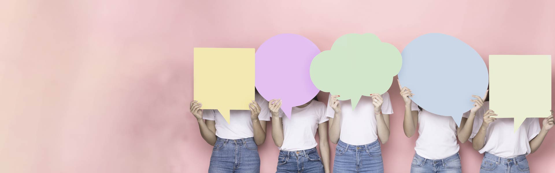 Young people holding speechbubbles